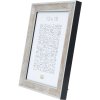 S40JE9 A silver coloured wooden photo frame with a dark brown cracked finish 30x45 cm